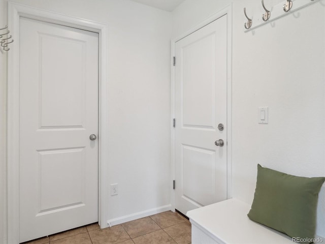 15350 W 50th Dr, Golden, CO 80403 - mudroom with light tile patterned floors and baseboards