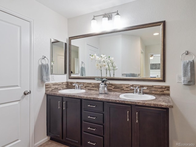 15350 W 50th Dr, Golden, CO 80403 - full bath with double vanity and decorative backsplash