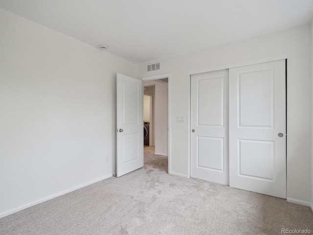 15350 W 50th Dr, Golden, CO 80403 - unfurnished bedroom with washer / clothes dryer, carpet floors, and baseboards