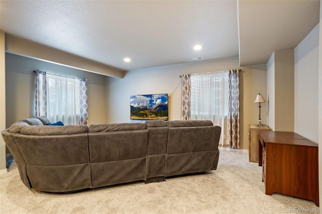 living room with light colored carpet