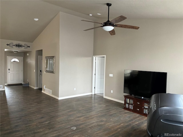 living room with ceiling fan, dark wood-type flooring, and high vaulted ceiling