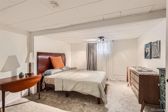 bedroom with light carpet