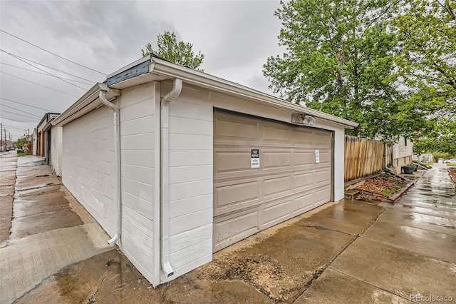 detached garage with fence