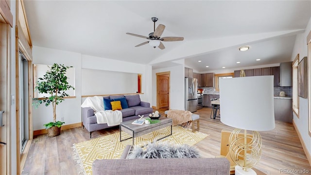 374 County Road 863, Tabernash, CO 80478 - living room with lofted ceiling, a ceiling fan, light wood finished floors, and recessed lighting