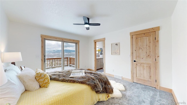 374 County Road 863, Tabernash, CO 80478 - bedroom featuring access to outside, carpet flooring, connected bathroom, and a ceiling fan