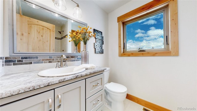 374 County Road 863, Tabernash, CO 80478 - bathroom featuring vanity, decorative backsplash, and a shower