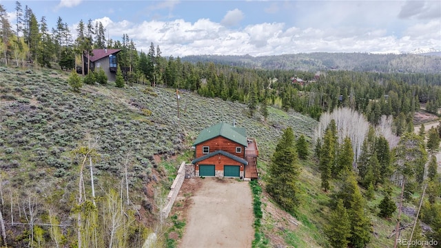 374 County Road 863, Tabernash, CO 80478 - aerial view of property and surrounding area with a heavily wooded area