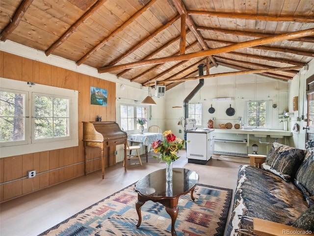 living area featuring wooden ceiling, wood walls, wood finished floors, and vaulted ceiling with beams