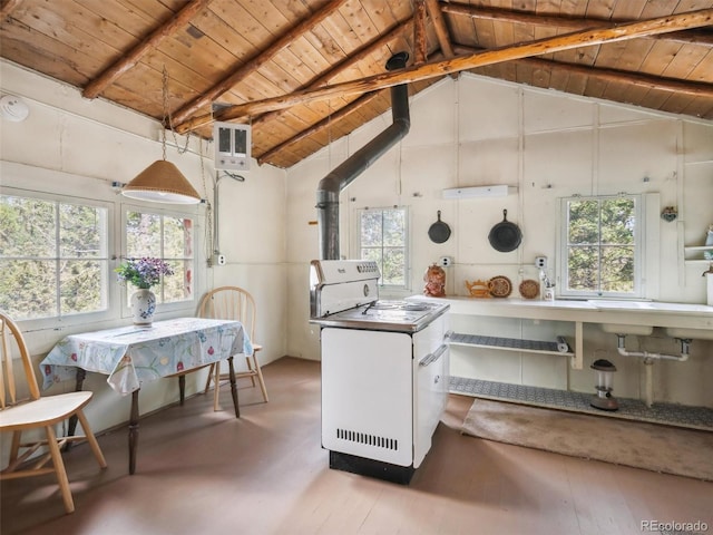 kitchen with vaulted ceiling with beams, visible vents, and wooden ceiling