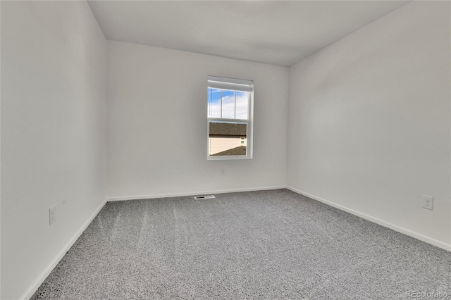 view of carpeted spare room