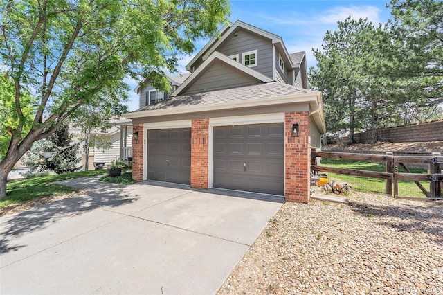 750 Deer Clover Cir, Castle Pines, CO 80108 - view of side of home featuring brick siding, driveway, roof with shingles, and a garage