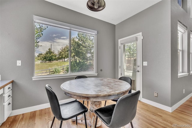 750 Deer Clover Cir, Castle Pines, CO 80108 - dining area featuring light wood-type flooring