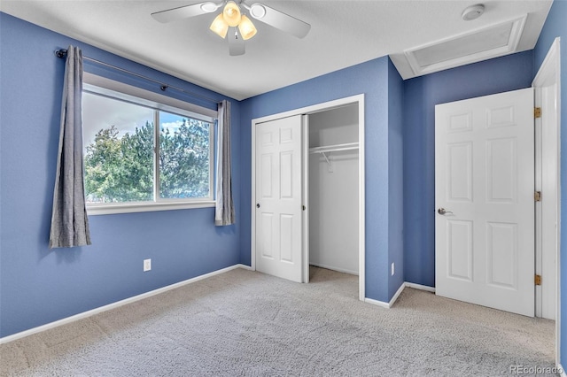 750 Deer Clover Cir, Castle Pines, CO 80108 - unfurnished bedroom with attic access, carpet floors, a closet, and ceiling fan