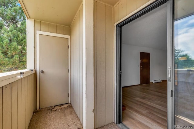512 E Monroe Dr Unit D438, Fort Collins, CO 80525 - property entrance featuring a balcony and a baseboard radiator