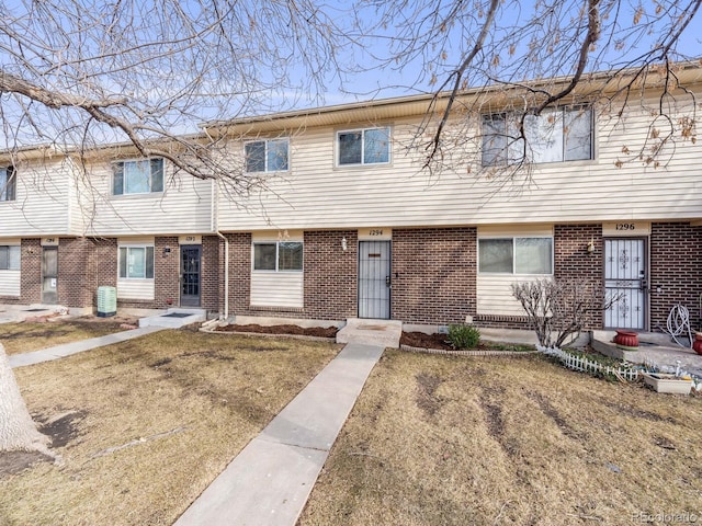 multi unit property featuring brick siding