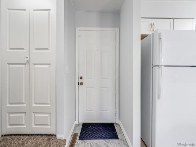 entryway with baseboards