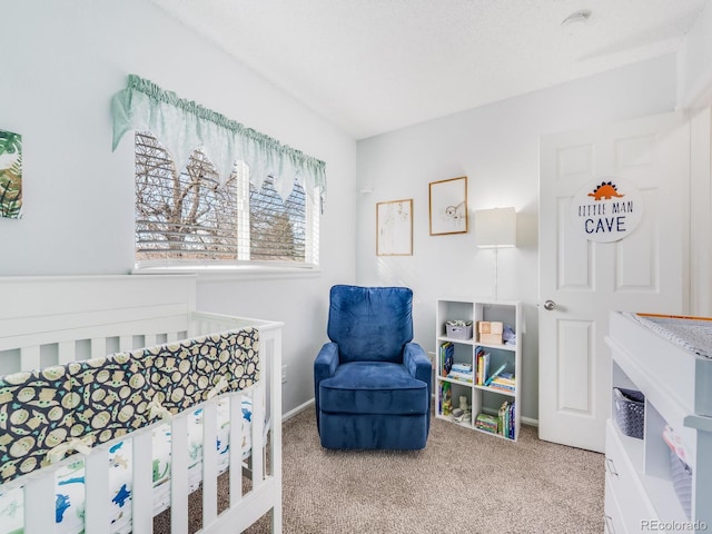 bedroom with carpet flooring and baseboards