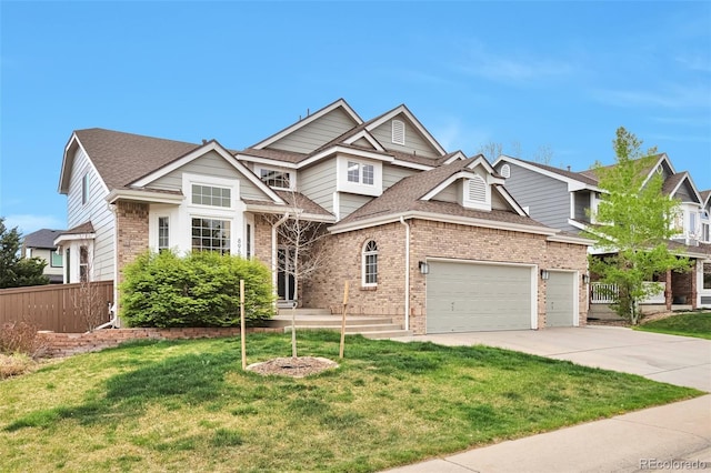 craftsman-style home featuring fence, roof with shingles, a front lawn, brick siding, and concrete driveway