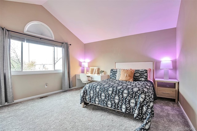 carpeted bedroom with baseboards, vaulted ceiling, and visible vents