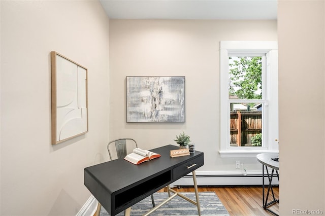3842 Zenobia St, Denver, CO 80212 - office space with a baseboard heating unit and wood finished floors