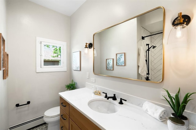 3842 Zenobia St, Denver, CO 80212 - bathroom with a baseboard radiator, vanity, toilet, and a shower