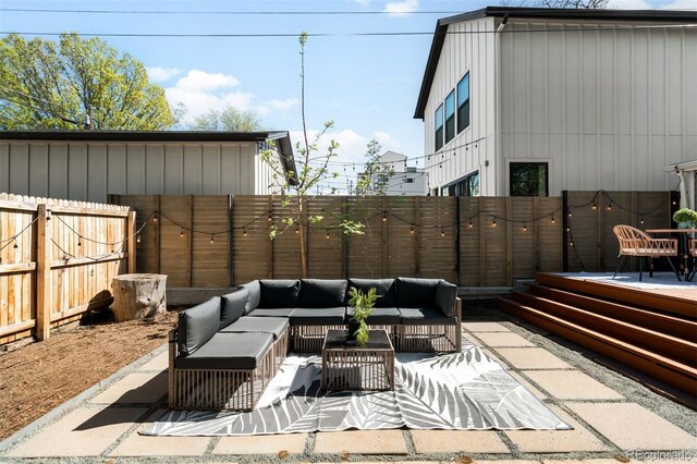 3842 Zenobia St, Denver, CO 80212 - view of patio / terrace with an outdoor hangout area and a fenced backyard