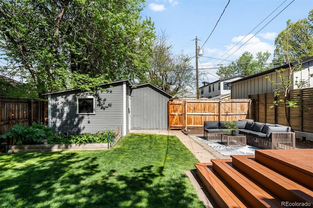 3842 Zenobia St, Denver, CO 80212 - view of yard featuring outdoor lounge area, a shed, an outbuilding, and a patio