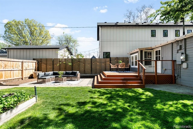 3842 Zenobia St, Denver, CO 80212 - view of yard featuring an outdoor hangout area, a wooden deck, and a garden