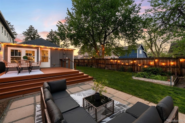 3842 Zenobia St, Denver, CO 80212 - patio terrace at dusk featuring an outdoor living space and a deck