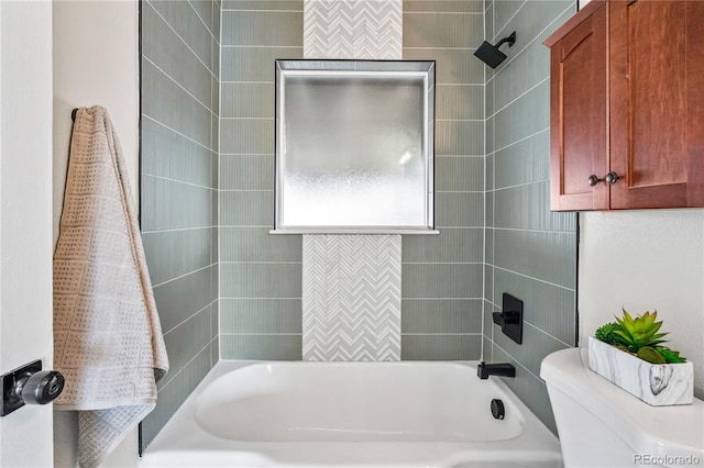 full bathroom featuring toilet and bathing tub / shower combination