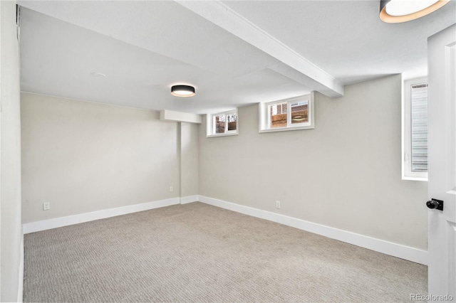 basement with carpet and baseboards