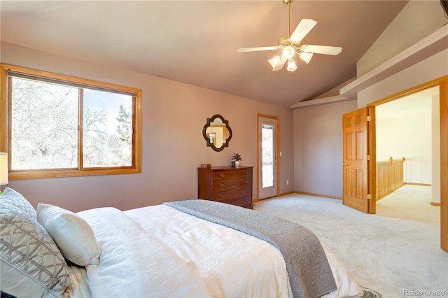 bedroom with light colored carpet, vaulted ceiling, ceiling fan, and baseboards