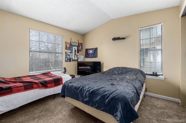 carpeted bedroom with a textured ceiling, baseboards, and vaulted ceiling