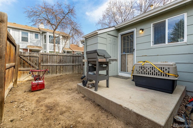 view of yard featuring a patio and a fenced backyard