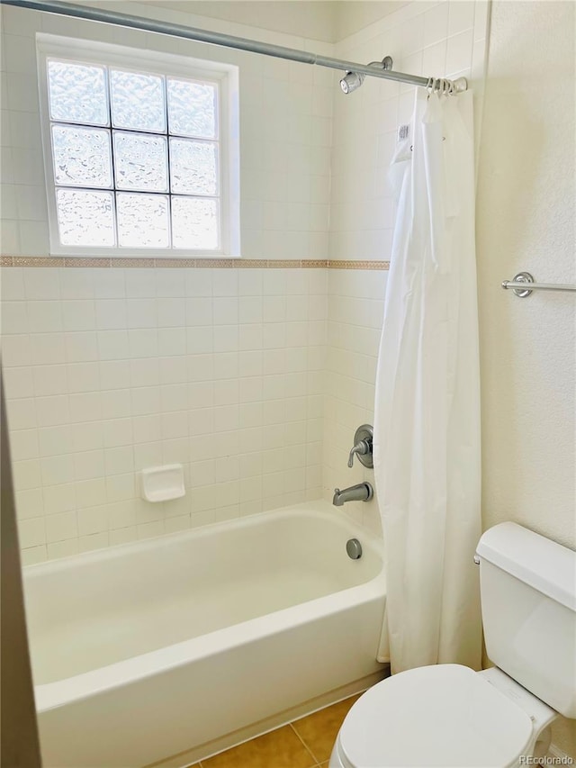 16866 E Peakview Ave, Aurora, CO 80016 - bathroom with shower / bath combo with shower curtain and tile patterned flooring