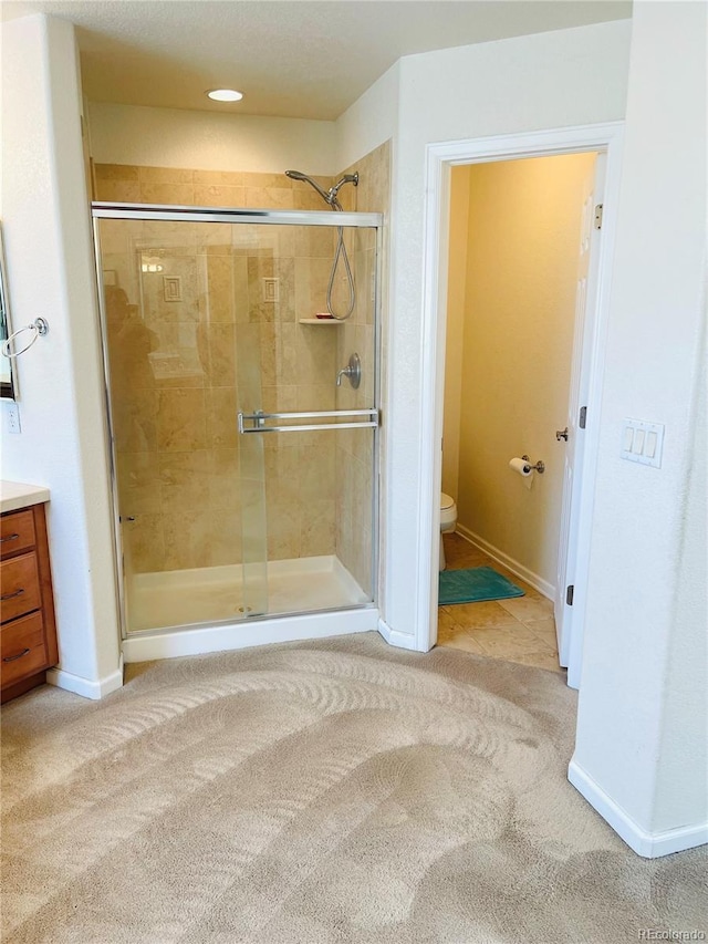 16866 E Peakview Ave, Aurora, CO 80016 - bathroom featuring a stall shower, carpet, vanity, and recessed lighting