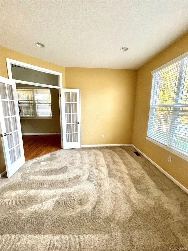 16866 E Peakview Ave, Aurora, CO 80016 - empty room featuring french doors and baseboards