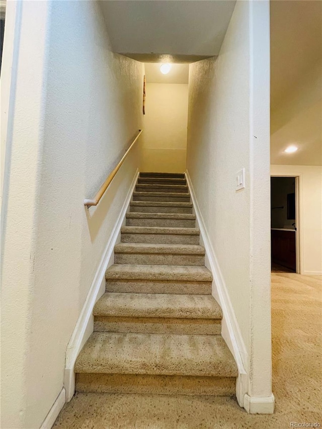 16866 E Peakview Ave, Aurora, CO 80016 - stairs featuring baseboards and carpet floors
