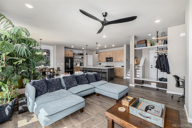 4522 Barrow Ln, Timnath, CO 80547 - living room with ceiling fan, recessed lighting, dark wood-style floors, and baseboards