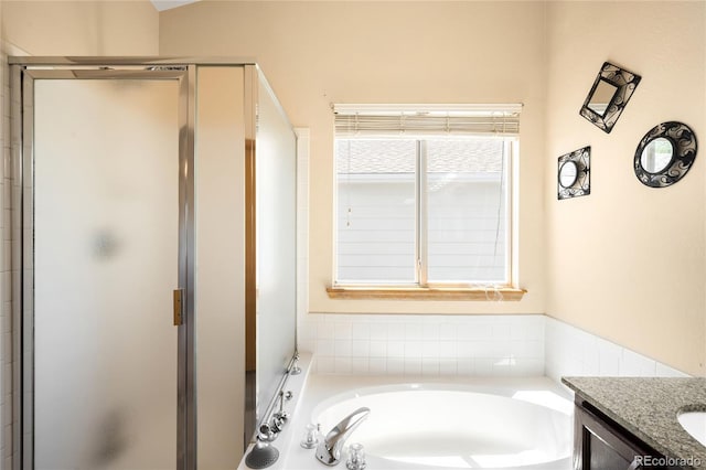 8879 Apache Plume Dr, Parker, CO 80134 - full bathroom with a shower stall, a bath, and vanity