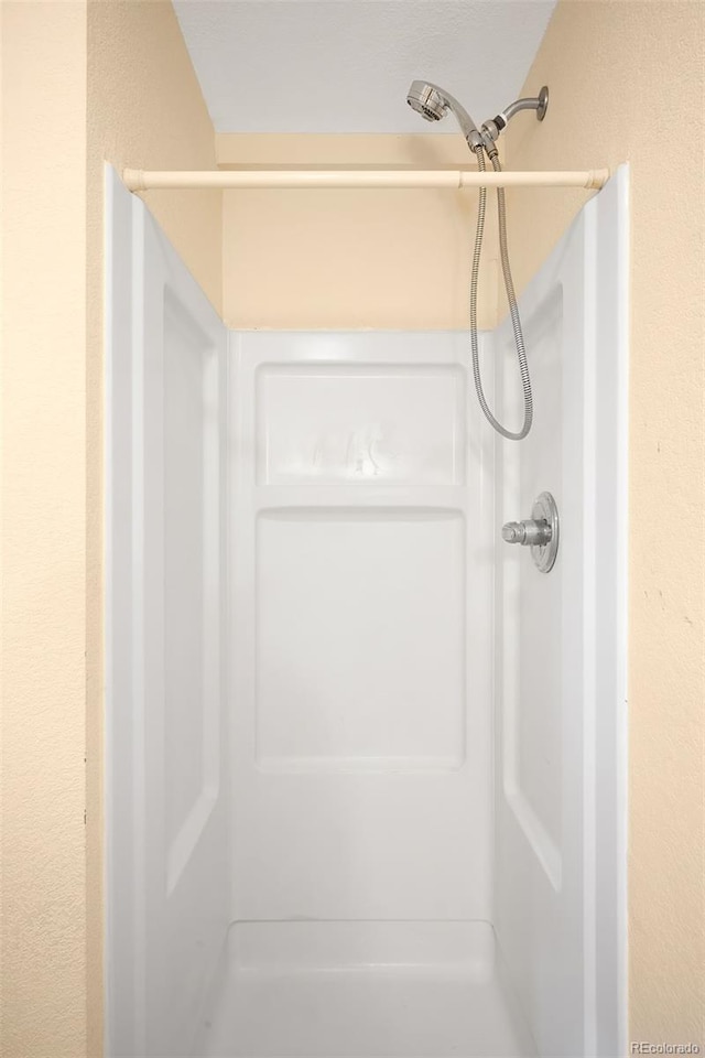 8879 Apache Plume Dr, Parker, CO 80134 - full bathroom featuring a shower