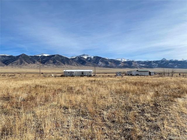 property view of mountains with a rural view