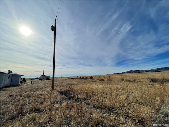 view of landscape with a rural view