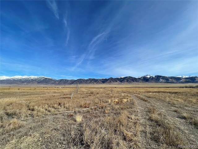 view of mountain feature with a rural view