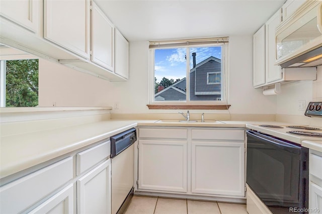 72 S Nome St, Aurora, CO 80012 - kitchen with white appliances, white cabinetry, light countertops, and light tile patterned floors