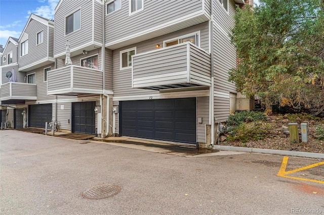 72 S Nome St, Aurora, CO 80012 - view of building exterior featuring an attached garage