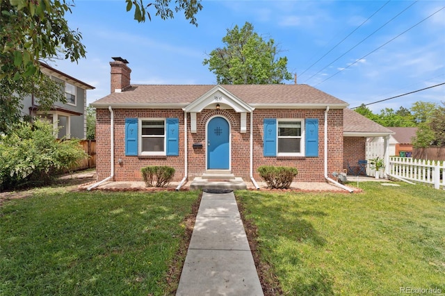 1691 Roslyn St, Denver, CO 80220 - bungalow with brick siding, entry steps, a chimney, and roof with shingles