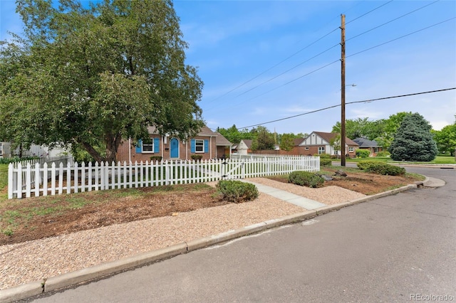 1691 Roslyn St, Denver, CO 80220 - view of front of house with a fenced front yard