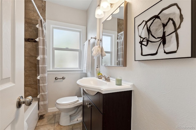 1691 Roslyn St, Denver, CO 80220 - bathroom with vanity, toilet, shower / bath combination with curtain, and tile patterned floors