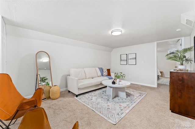 1691 Roslyn St, Denver, CO 80220 - living area with light carpet, baseboards, and lofted ceiling
